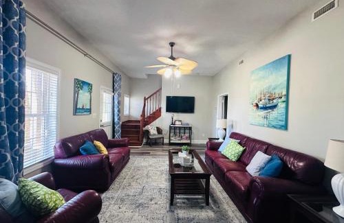 Cedar Point House | Pets welcome in a spacious 1 bedroom with a fenced in backyard and treadmill