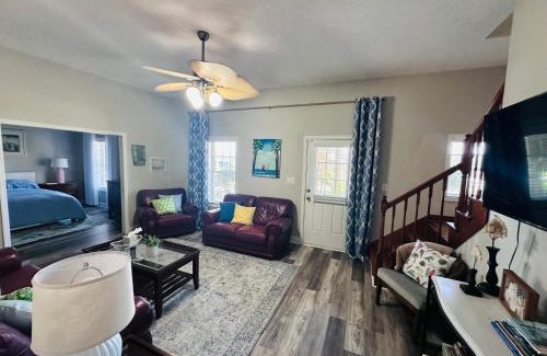 Cedar Point House | Pets welcome in a spacious 1 bedroom with a fenced in backyard and treadmill