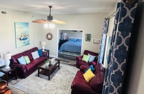 Cedar Point House | Pets welcome in a spacious 1 bedroom with a fenced in backyard and treadmill