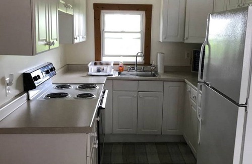 Pine Point Cottage | Pine Point Promises- Sunset Cottage - 2 minute walk to beach-sleeps 4 in beds.