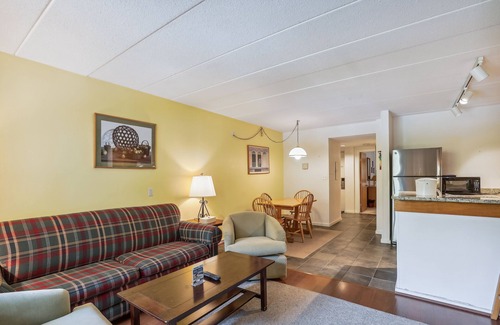 Killington Condo | Pinnacle E05 Close to skiing and riding, with shuttle to the slopes everyday of the week. The outdoor pool, hot tub, and, tennis courts are open during summer only.