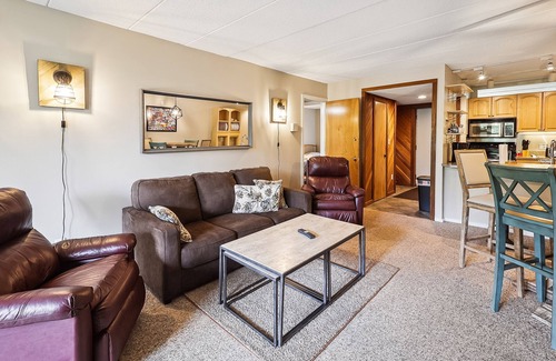 Killington Condo | Pinnacle F08 Cozy, charming and renovated offering shuttle to the slopes everyday of the week. Pinnacle F08 The outdoor pool, hot tub, and, tennis courts are open during summer only.