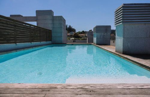 Vigo Apartment | Piscina y garaje cerca del centro by CABANA Rentals
