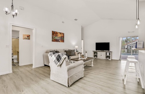 Lake Wilson Preserve House | Pleasant pool-view home with private pool, patio, streaming, enclosed lanai & AC