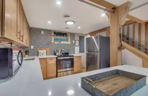 East Stroudsburg House | Poconos Vacation Home For Rent - Creekside Retreat With Inground Pool & Hot Tub.