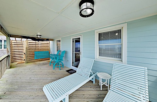 Ocracoke House | Point Of View: Relax on the deck watching passing boats and kayaks.