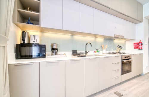 Dubai Production City Apartment | Polished 1BR at Noor 1 Midtown Dubai Production City by Deluxe Holiday Homes