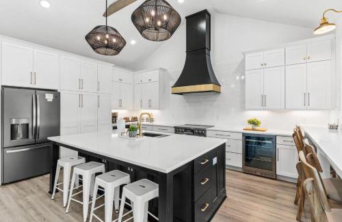 Long Beach House | Pomegranate 8 bedroom, 6 full and 2 half bathroom custom-built home with a private heated pool!