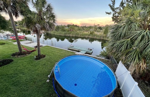 Hernando Beach House | Pool home located on canal.
