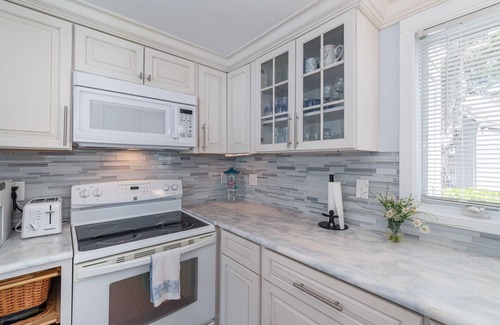 Mews Village Condo | Pool Villas- 2 bedroom, 2 bath, sleeps 4, heated pool, gas fireplace & grill