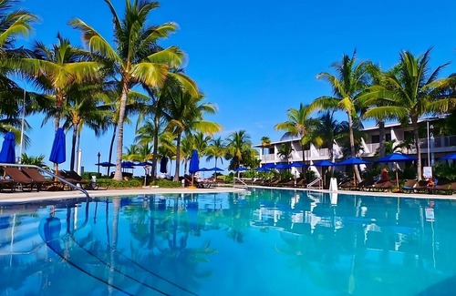 Marathon Hotel | Poolside Relaxation and Private Kitchen Amenities for the Perfect Stay!