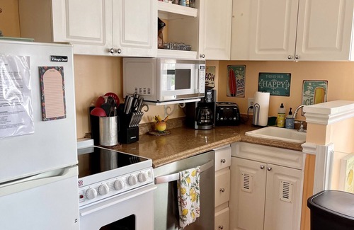 Tybee Island Condo | Popular condo, steps from the beach. Private & Pet Friendly.