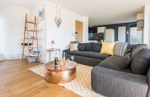 Carbis Bay House | Porthia, stylish and spacious inside and out. Sunny terraces with sea views. Garage parking. Free WiFi.