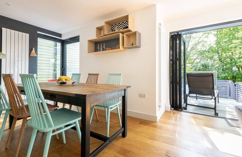 Carbis Bay House | Porthia, stylish and spacious inside and out. Sunny terraces with sea views. Garage parking. Free WiFi.