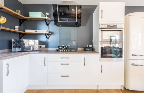 Carbis Bay House | Porthia, stylish and spacious inside and out. Sunny terraces with sea views. Garage parking. Free WiFi.