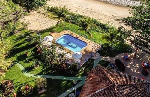 Cumuruxatiba Hotel | Pousada É