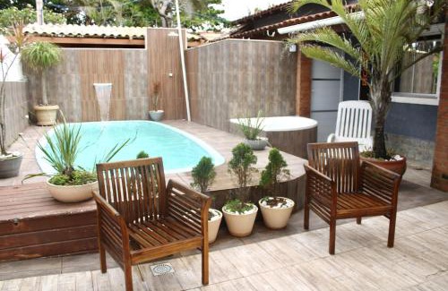 Unamar House | Pousada a 1 minuto da praia - UNR ZonaX