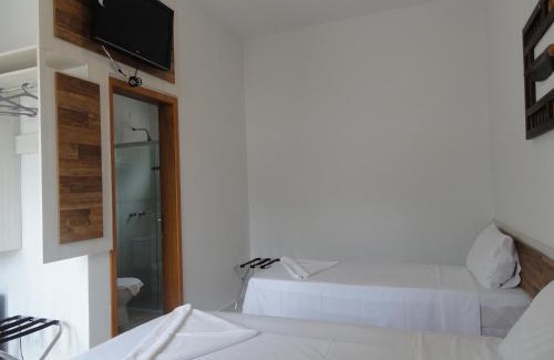 Praia da Enseada Hotel | Pousada Pescador