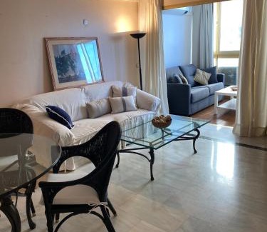 Marbella Seafront Promenade Apartment | Precioso apartamento en primera línea de playa