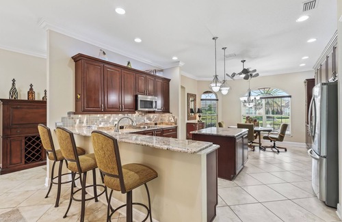 The Villages House | Premier Golf Course Home - includes Golf Cart and Covered Outdoor Kitchen!