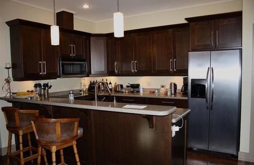 Revelstoke Condo | Premier Silverbear Penthouse Condo - Hot tub, spacious, wrap around deck