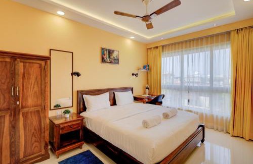 Chicalim Apartment | Premium 2BHK -10 min to GOI airport & beach -Pool access -Balcony with city view