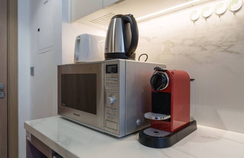 Nad Al Sheba Apartment | Premium Studio in Azizi Riviera