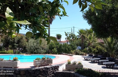 El Paso Apartment | pretty apartment with sun terrace in the subtropical garden with WiFi and pool