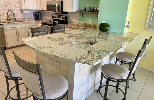 New Smyrna Beach House | Pristine Tropical Getaway Townhouse Across Street from the Beach!