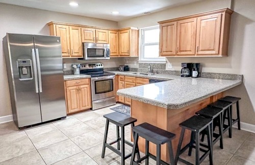 Pensacola House | Private 4 bedroom house near the beach with pool, hot tub, fire pit, game room.