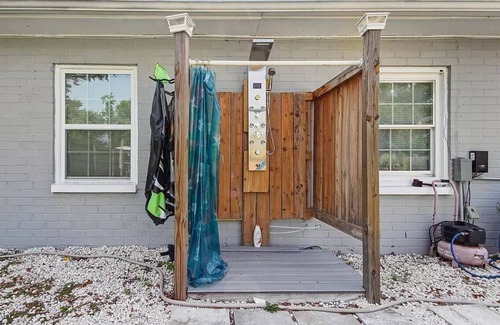 Pretty Bayou House | Private Bungalow with pool across the street from bay! 5 min drive to the beach.