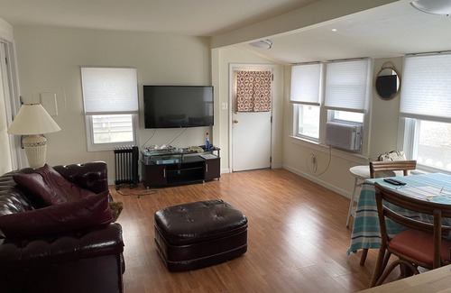 Ortley Beach Cottage | Private cottage walking distance to beach, bay, surfing, boardwalk & playground.