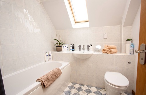 Alness Bed & Breakfast | Private En-Suite Room with calming views over barley fields and forests beyond.