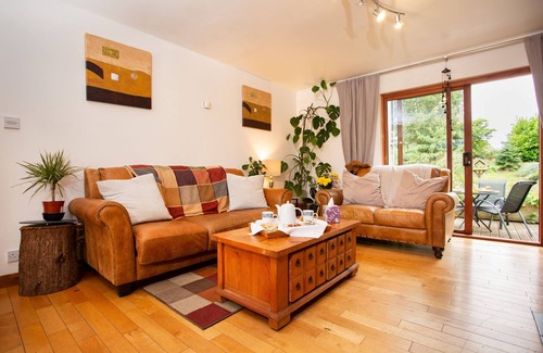 Alness Bed & Breakfast | Private En-Suite Room with calming views over barley fields and forests beyond.