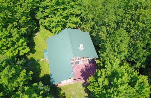 Rhinelander House | Private Lake House with 2200 feet of Frontage on 70 acres