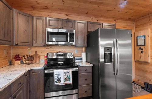 Elk Park Cabin | Private lakefront cabin with mountain views/hot tub/firepit/game room/hiking/etc