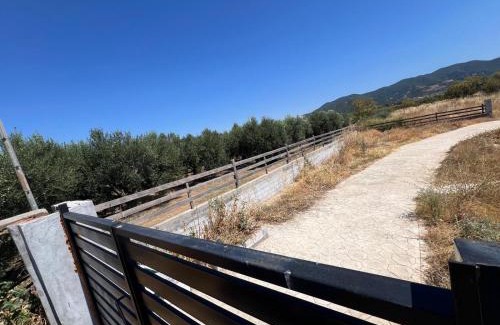 Amphipolis Other | Private Parking for Cars, Vans, Campers, Bus, RV, Trailer & Caravan with Easy Access to Expressway & Main Road - Quiet Location with Mountain Views, Near the Beach, with 2 Lose Guard Dogs, No Water or Electric, No Shower or Toilet - Self Check-in