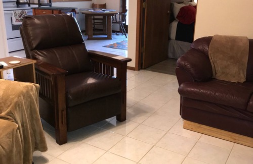 Hollister Apartment | Private suite with a walk-out concrete patio on the lake with access to the dock