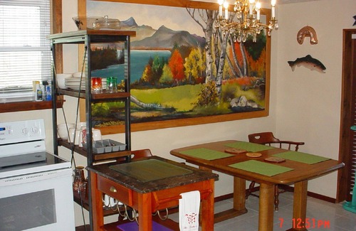 Hollister Apartment | Private suite with a walk-out concrete patio on the lake with access to the dock