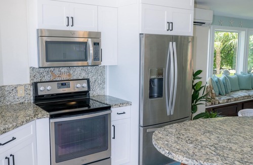 Long Key House | Private Waterfront Home, Heated Pool, Beach, Tiki w/Grill, Dock, Kayaks, Sunset