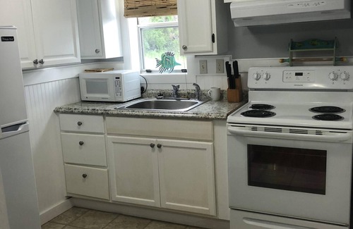 Savannah Beach Villa | Private Waterfront Family Complex with Dock, Walk to Beach. Angler's Dream.