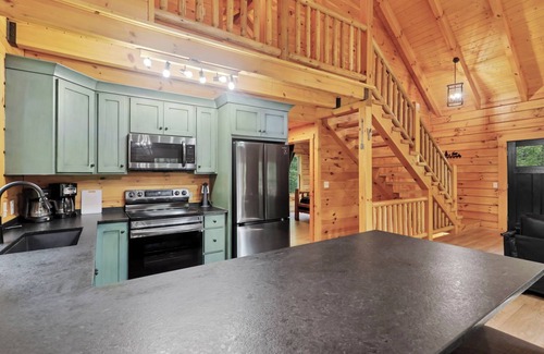 Logan Cabin | Private & Wooded Cabin with Eat-In Kitchen, Hot Tub, Fire Pit & Game Room