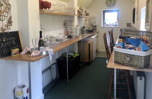 West Runton Apartment | Quaint & Quirky 2 Bedroom Garden Annex, 10 minute walk to beach and Sheringham.