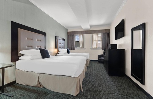 Midtown Village Hotel | Quality Inn Center City