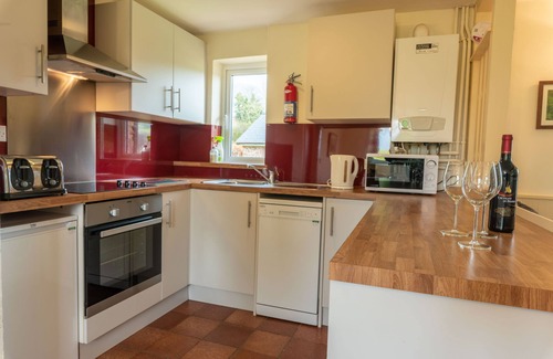 Wheddon Cross Cottage | Quarme Cottage is located in the heart of Exmoor National Park at Wheddon Cross. Dog friendly