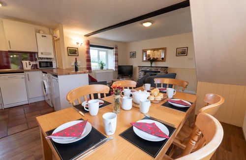 Wheddon Cross Cottage | Quarme Cottage is located in the heart of Exmoor National Park at Wheddon Cross. Dog friendly