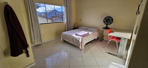 Unai House | Quarto com banheiro privativo