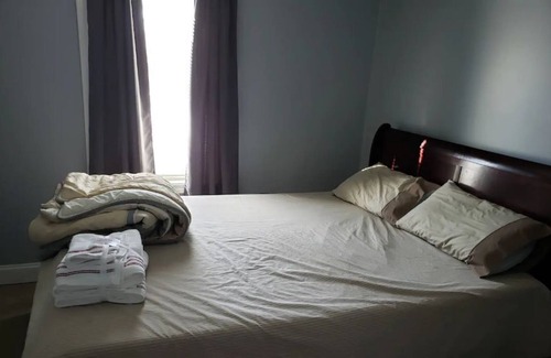 Fall River House | Queen bed close to everything.