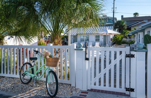 Treasure Island House | Queen studio suite w kitchen, steps to the beach and Johns Pass. HEATED POOL.