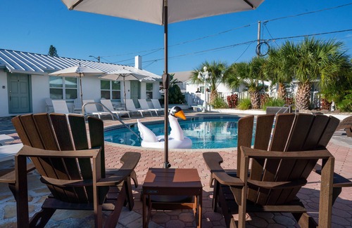 Treasure Island House | Queen studio suite w kitchen, steps to the beach and Johns Pass. HEATED POOL.